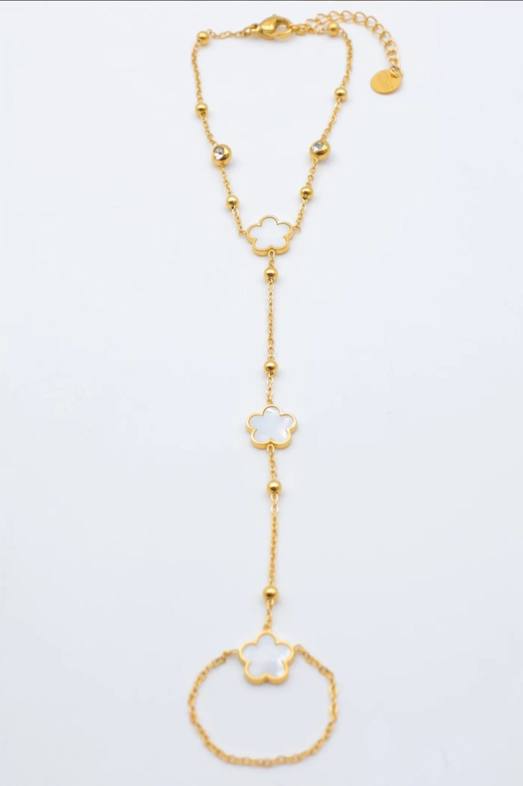 Bijou de main Edelia fleurs nacrées doré femme