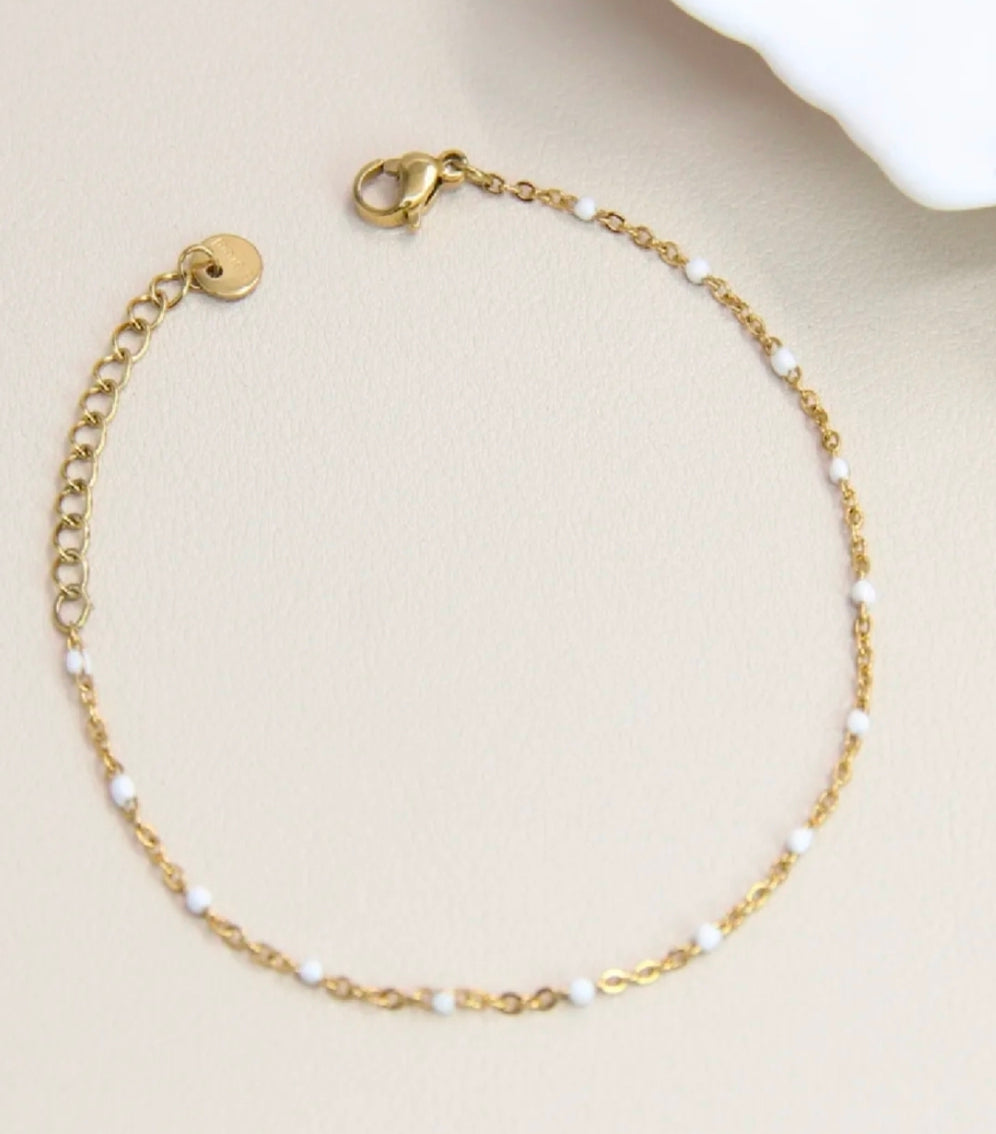 Bracelet Linea maille fine perles émaillées blanches doré femme